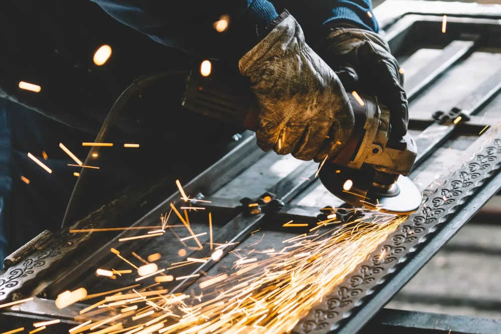 man-works-with-grinder-machine-2025-04-28-03-42-50-utc